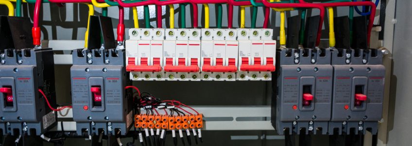 Close up circuit breakers and wire in control panel